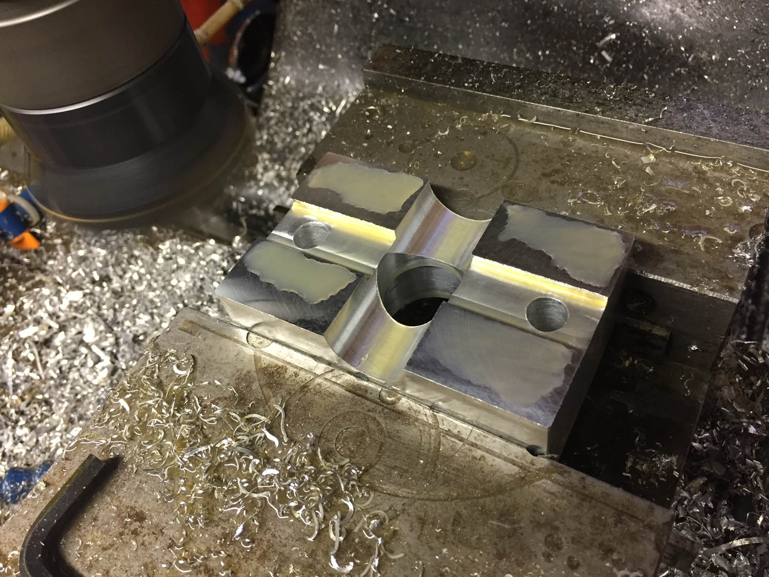Part machining. Jig used for drilling holes in aluminium airline installations.