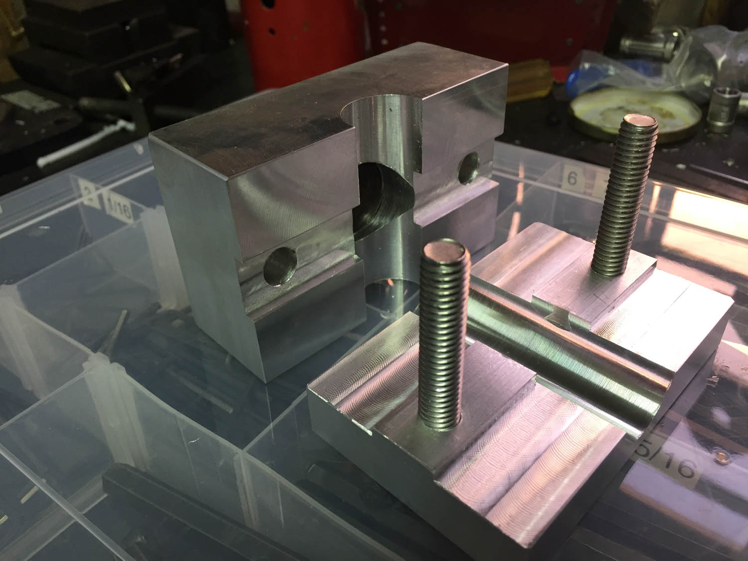 Part machining. Jig used for drilling holes in aluminium airline installations.