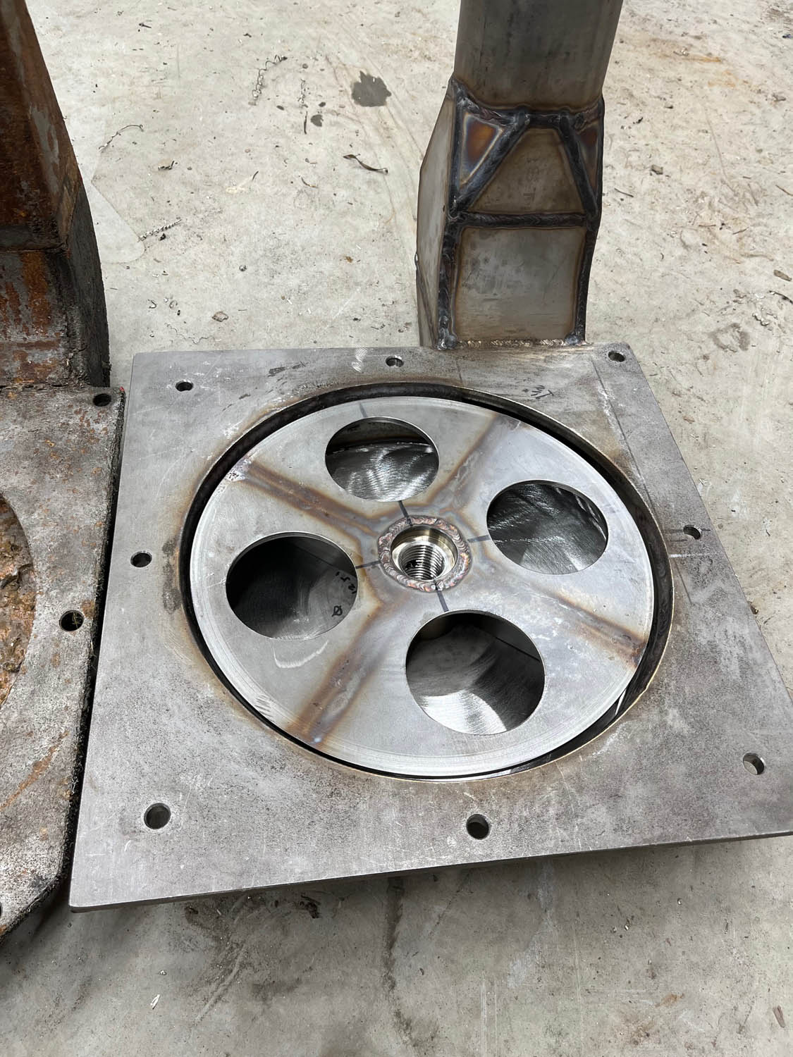 old, rusted, broken pump housing replaced by new stainless steel custom fabricated housing